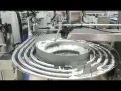 Macchina per l'assemblaggio del raccoglitore di muco nasale