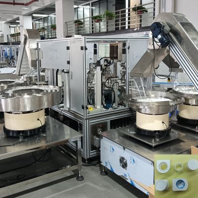 Macchina assemblaggio tappi elica per latte da due a dieci cavità, operazione 1 persona