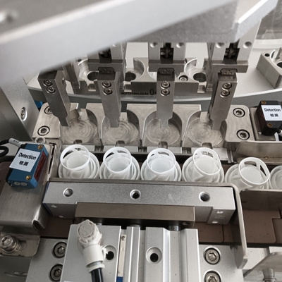 Macchina di assemblaggio di sigillamento automatico con contenitore di scarico del desicante che può proteggere il desicante dall'umidità e dall'inquinamento